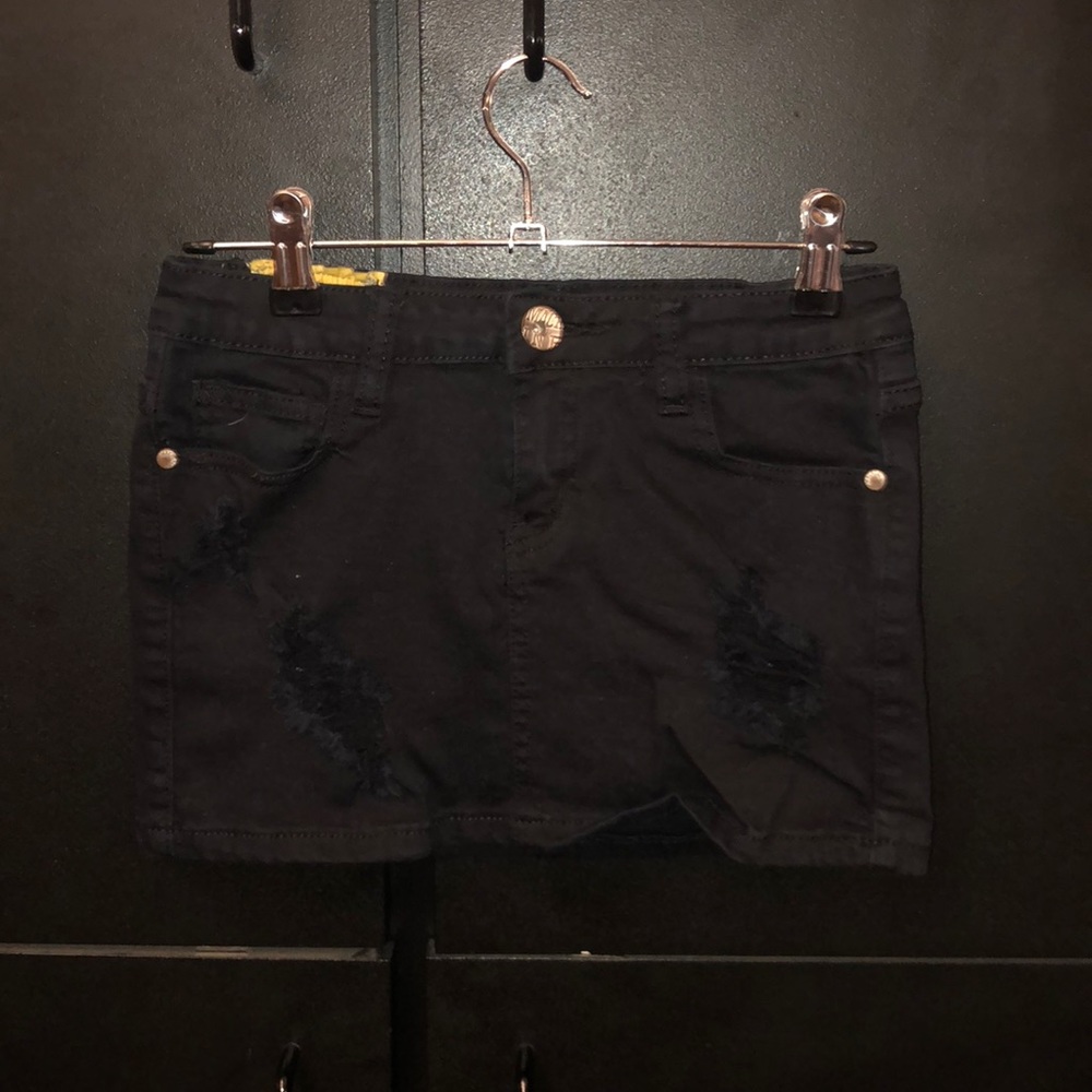 Ripped mini denim skirt